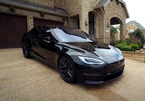 Tesla PLAID with steering wheel.
