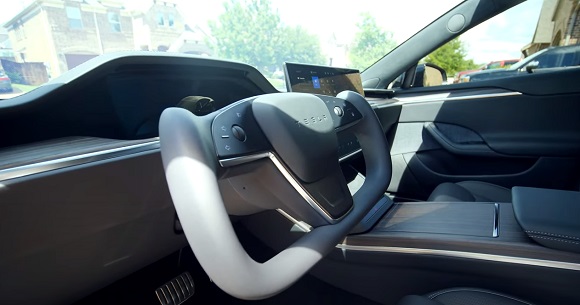 Tesla PLAID with steering wheel.